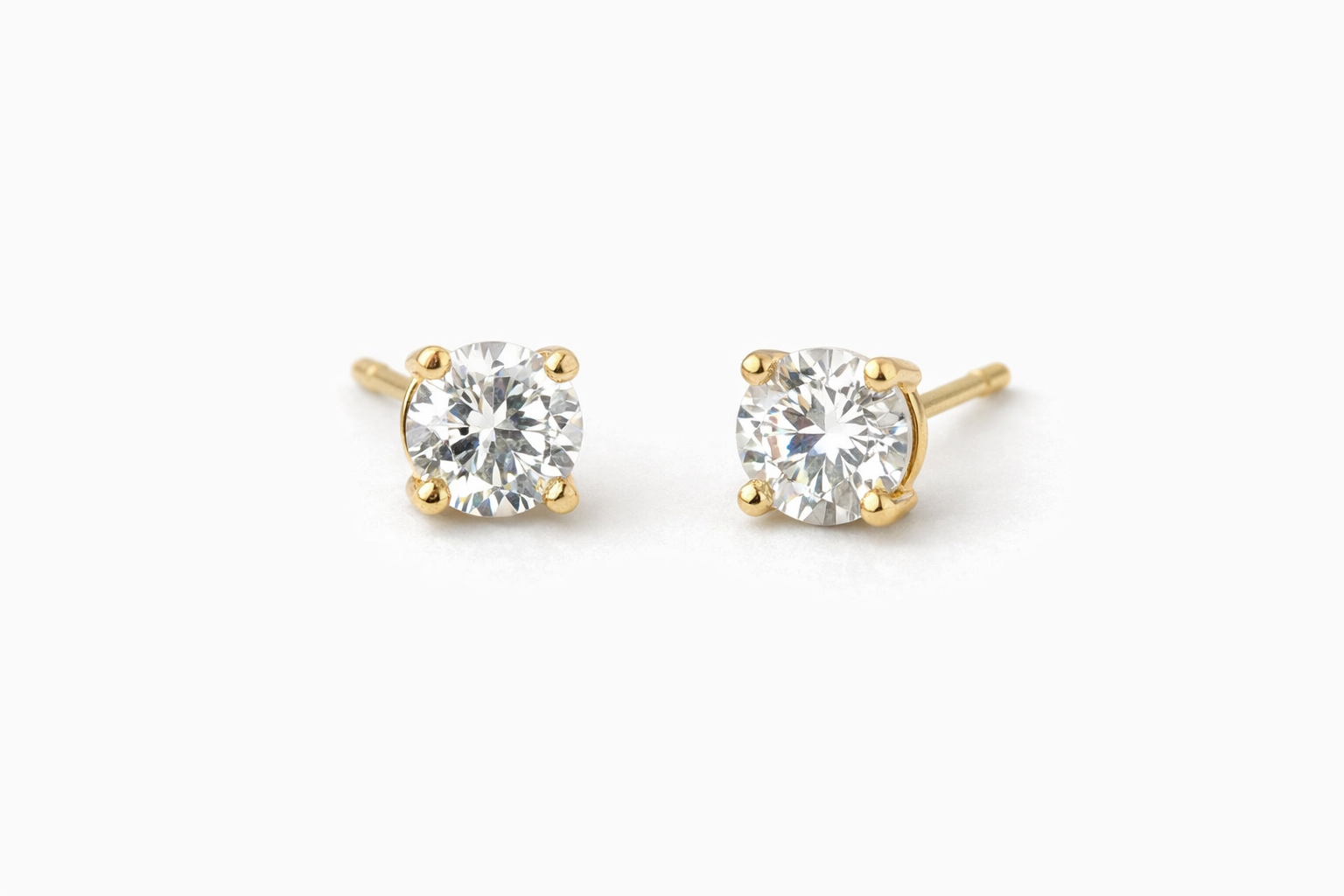 Solitaire Diamond-Cut Stud Earrings
