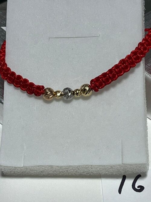 Red bracelet woven with beads